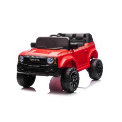 Mașinuță electrică Toyota Landcruiser 12V, roșu, scaun lat, telecomandă 2.4 GHz, intrare USB / AUX, Bluetooth, suspensie, baterie litiu, lumini LED, motor 2 x 25W, licență ORIGINALĂ
