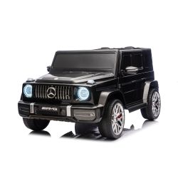 Mașină electrică de jucărie Mercedes-Benz G63 AMG 4x4 cu două locuri, negru, player MP3 cu conexiune USB/AUX și Bluetooth, tracțiune 4x4, baterie litiu, roți EVA cu suspensie, scaune din piele artificială, telecomandă, licență originală
