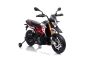 Motocicletă electrică copii APRILIA DORSODURO 900, Licențiată, baterie 12V, roți EVA moi, 2 x 18W Motoare, Suspensie, cadru metalic, furcă metalică, roți auxiliare, roșu 