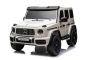 Mașină electrică Mercedes-Benz G63 AMG 4x4 cu două locuri 12V, alb, MP3 Player cu intrare USB/AUX, tracțiune 4x4, baterie 12V14Ah, roți EVA cu suspensie, scaune din piele, telecomandă, licențiat